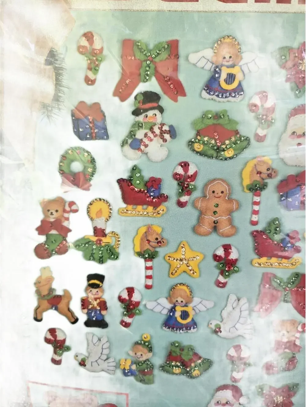 Bucilla Lotsa Christmas Felt Ornament Kit - Set of 50 Holiday Decorations open